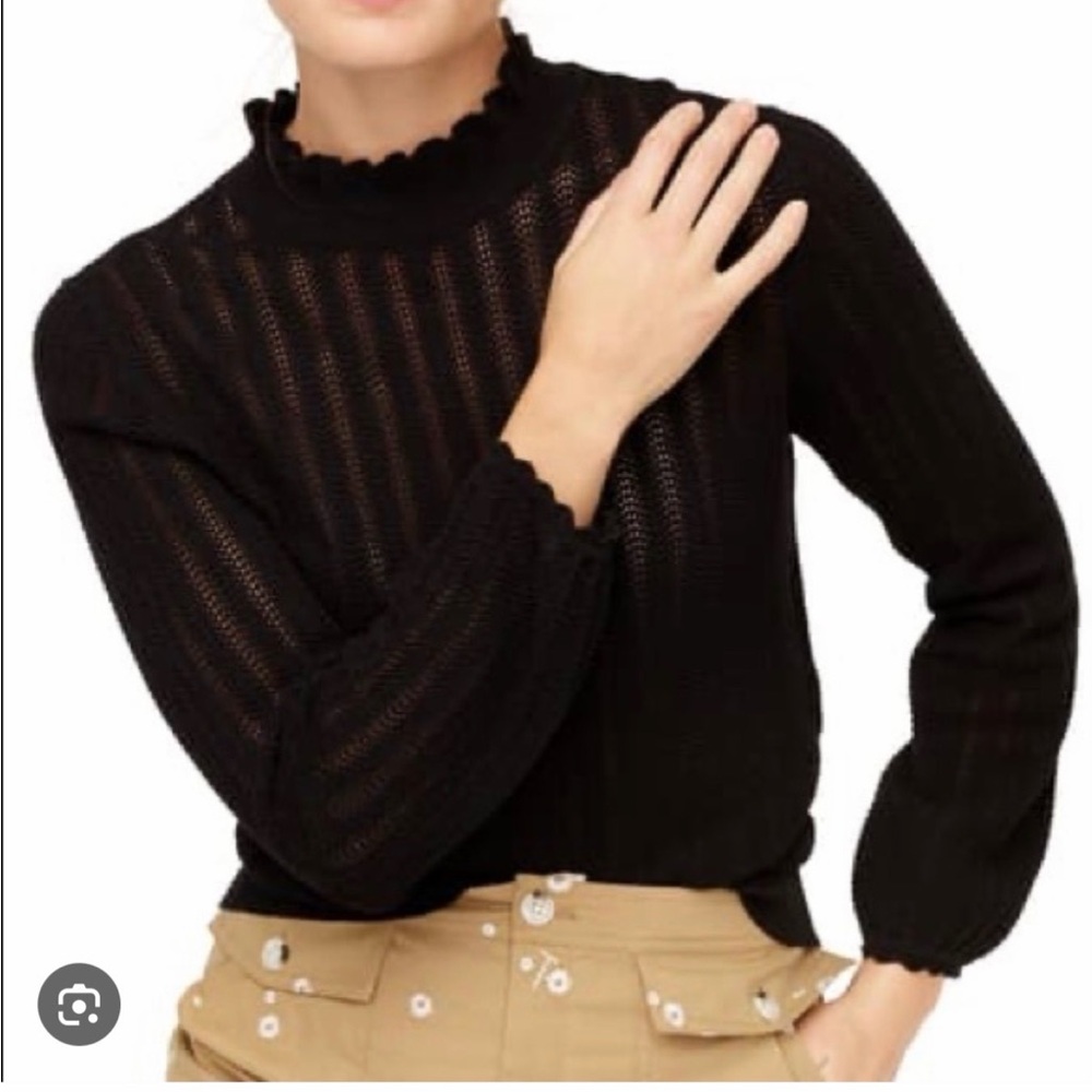 Pointelle ruffle neck sweater